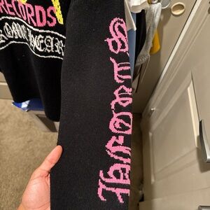 Black and pink chrome heart sex records knit sweater
